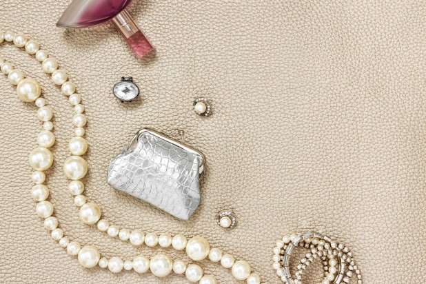 Silver purse, jewelry and perfume