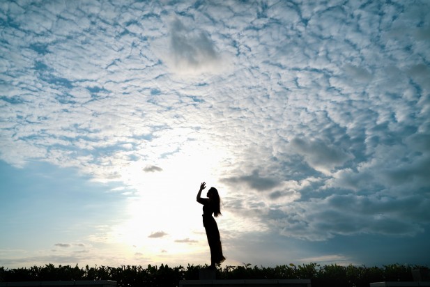 Asian women do yoga under the sky