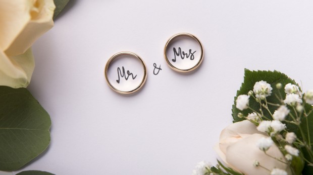 Creative Wedding rings mr and mrs on white background