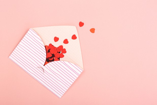 Envelope on pink background